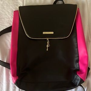 Love this bag but I won't be using it. Interior is pink. Super cute